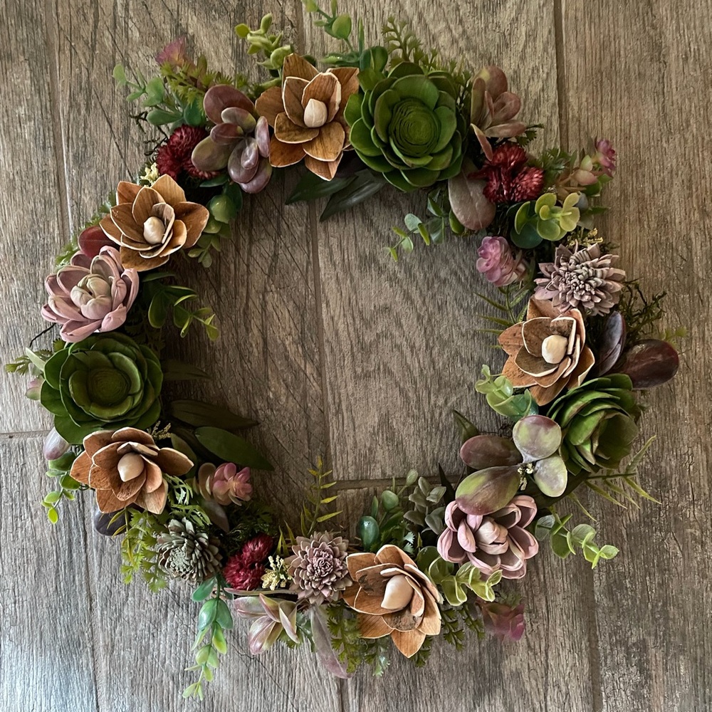 14” wreath filled with sola wood succulents.